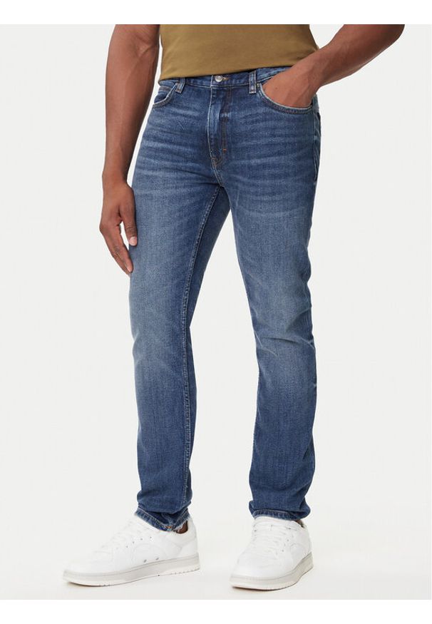 Hugo - HUGO Jeansy 50542688 Niebieski Extra Slim Fit. Kolor: niebieski