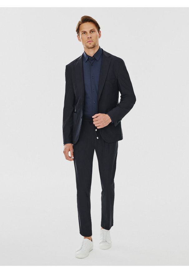 Pako Lorente - PAKO LORENTE – Marynarka garniturowa w kolorze granatowym. Kolor: niebieski. Materiał: elastan, poliamid. Wzór: gładki