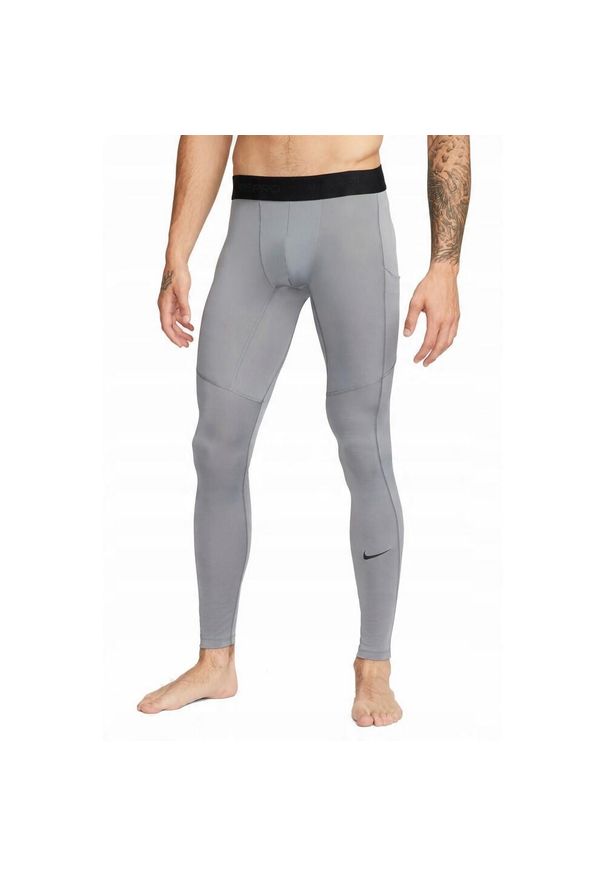Nike - Męskie Spodnie Termiczne Pro. Kolor: szary. Długość: długie