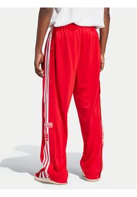 Adidas - adidas Spodnie dresowe Adibreak IY9924 Czerwony Loose Fit. Kolor: czerwony. Materiał: syntetyk #4