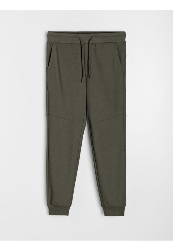 Sinsay - Spodnie jogger dresowe pique - khaki. Kolor: brązowy. Materiał: dresówka