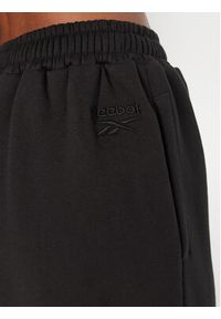 Reebok Spodnie dresowe Reebok X Ewa Chodakowska RK25306CCW Czarny Regular Fit. Kolor: czarny. Materiał: bawełna