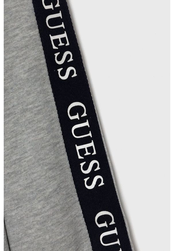 Guess - Bluza dziecięca. Okazja: na co dzień. Typ kołnierza: kaptur. Kolor: niebieski. Materiał: dzianina, bawełna. Wzór: melanż. Styl: casual