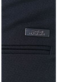 Armani Exchange - Spodnie. Kolor: niebieski. Materiał: tkanina. Wzór: gładki #3