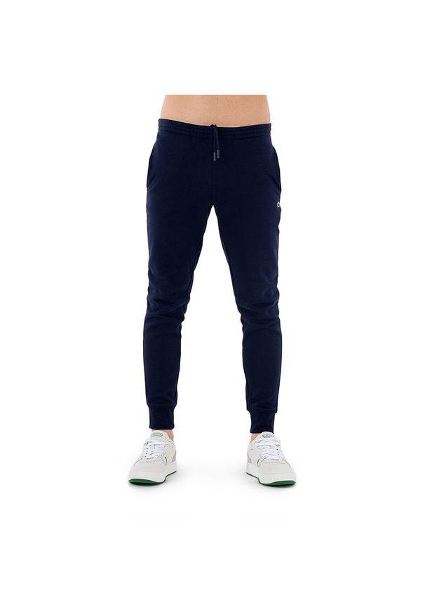 Spodnie Lacoste Tracksuit Trousers Bottom XH9624-166 - granatowe. Kolor: niebieski. Materiał: materiał, bawełna, dresówka, poliester