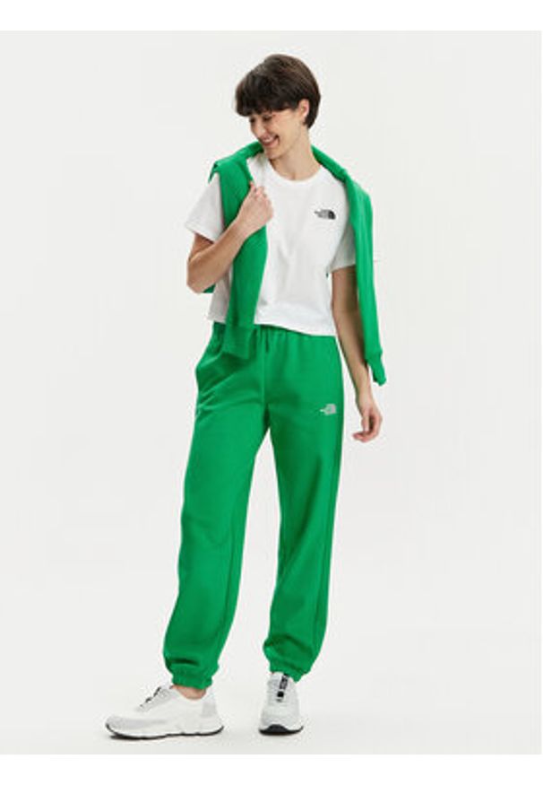 The North Face Spodnie dresowe Essential NF0A7ZJF Zielony Relaxed Fit. Kolor: zielony. Materiał: bawełna, syntetyk
