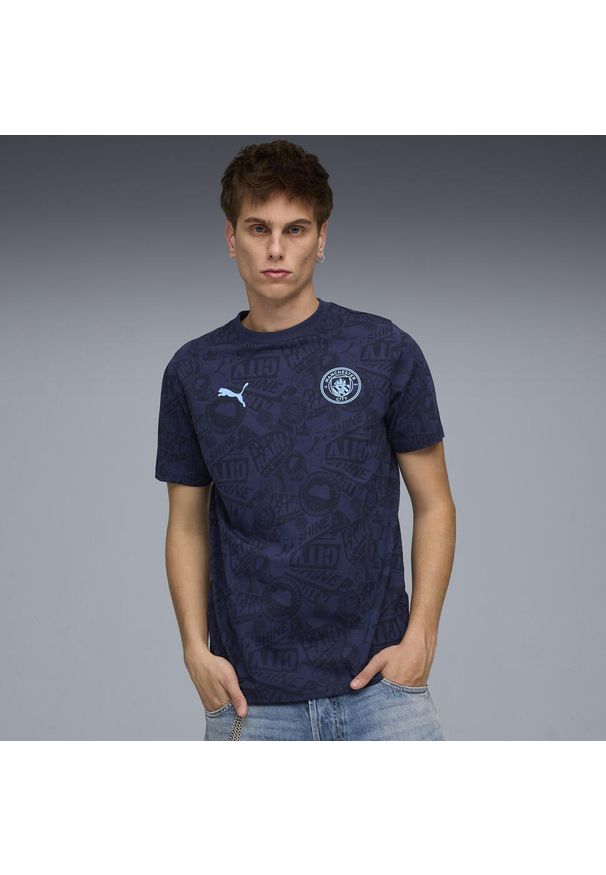 Puma - Męska koszulka Manchester City FtblCulture z nadrukiem na całej powierzchni PUMA. Kolor: niebieski. Wzór: nadruk