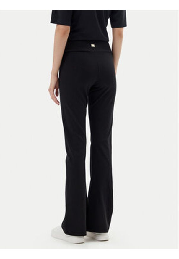 EA7 Emporio Armani Legginsy 7W000081 AF12484 UC001 Czarny Flare Fit. Kolor: czarny. Materiał: bawełna