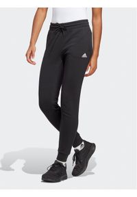 Adidas - adidas Spodnie dresowe Essentials Linear French Terry Cuffed Joggers IC6868 Czarny Slim Fit. Kolor: czarny. Materiał: bawełna #1