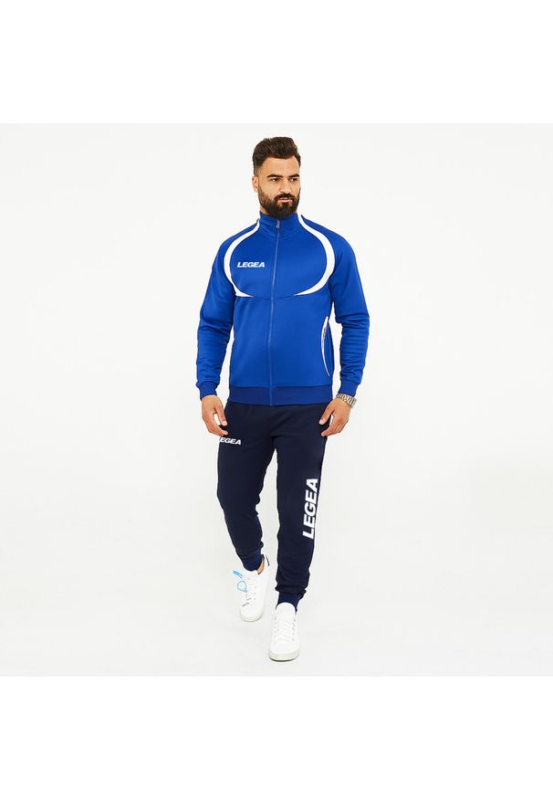 LEGEA - Dres sportowy dziecięcy SINGAPORE BOGOTA rozmiar dziecięcy. Okazja: na uczelnię. Kolor: niebieski. Materiał: dresówka. Wzór: haft. Styl: sportowy