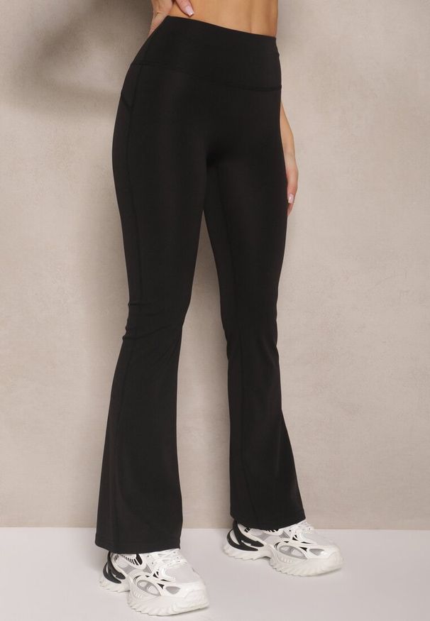 Renee - Czarne Legginsy Typu Dzwony High Waist Edinelia. Okazja: na co dzień. Stan: podwyższony. Kolor: czarny. Wzór: aplikacja. Styl: casual