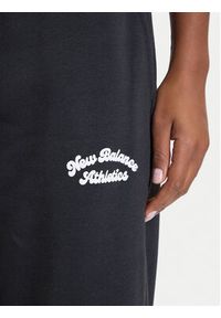 New Balance Spodnie dresowe WP53902 Czarny Relaxed Fit. Kolor: czarny. Materiał: bawełna, syntetyk #2