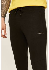 Craft - Spodnie. Kolor: czarny. Materiał: bawełna, poliester, dzianina. Wzór: gładki #5