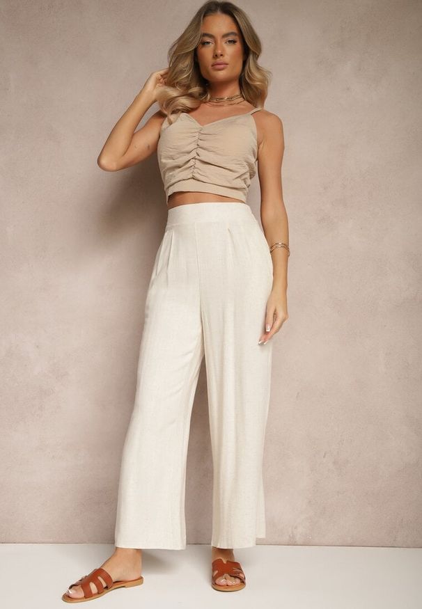 Renee - Beżowe Szerokie Spodnie z Lnem High Waist Sanariela. Okazja: na co dzień, do pracy. Stan: podwyższony. Kolor: beżowy. Materiał: len. Sezon: lato, wiosna. Styl: klasyczny, elegancki, casual