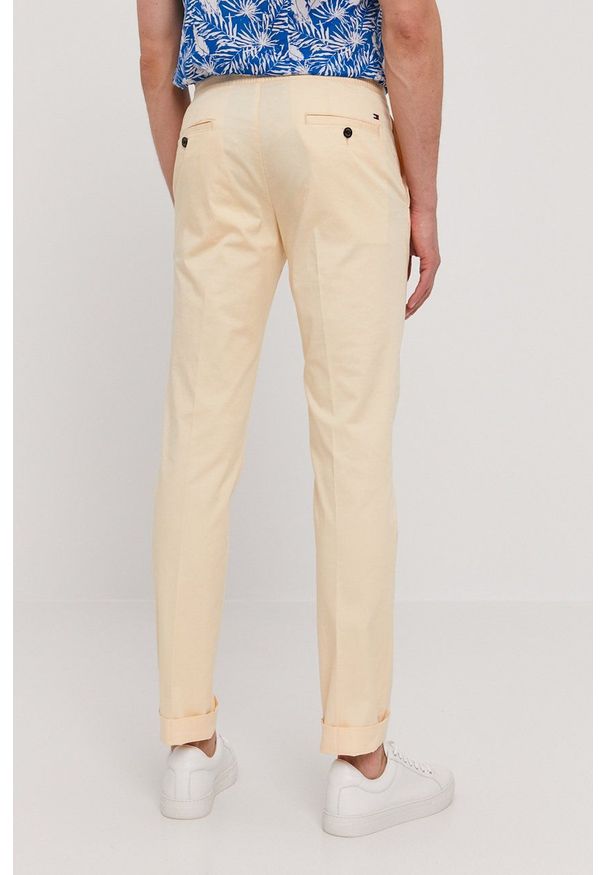 TOMMY HILFIGER - Tommy Hilfiger - Spodnie. Okazja: na co dzień. Kolor: beżowy. Styl: casual