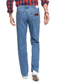 Wrangler - WRANGLER SPODNIE MĘSKIE TEXAS BLAZING BLUE W121Q472X. Stan: podwyższony