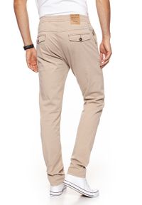 Wrangler - WRANGLER SPODNIE MĘSKIE DRAWSTRING CHINO CAMEL WASHED W16DP749J $. Materiał: materiał #7