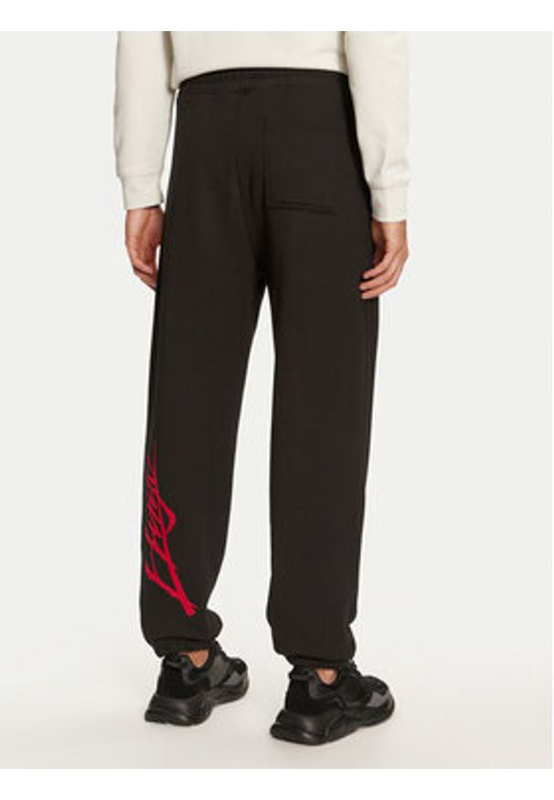 Hugo Spodnie dresowe Dlogopante 50521082 Czarny Relaxed Fit. Kolor: czarny. Materiał: bawełna