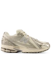 Buty unisex New Balance U1906RCN - beżowe. Kolor: beżowy. Materiał: guma, syntetyk, materiał. Szerokość cholewki: normalna. Sport: turystyka piesza