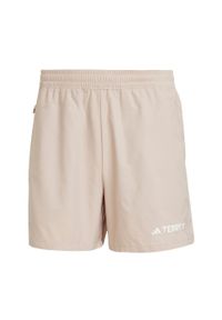 Adidas - Szorty Terrex Multi. Kolor: beżowy. Materiał: materiał. Sport: turystyka piesza