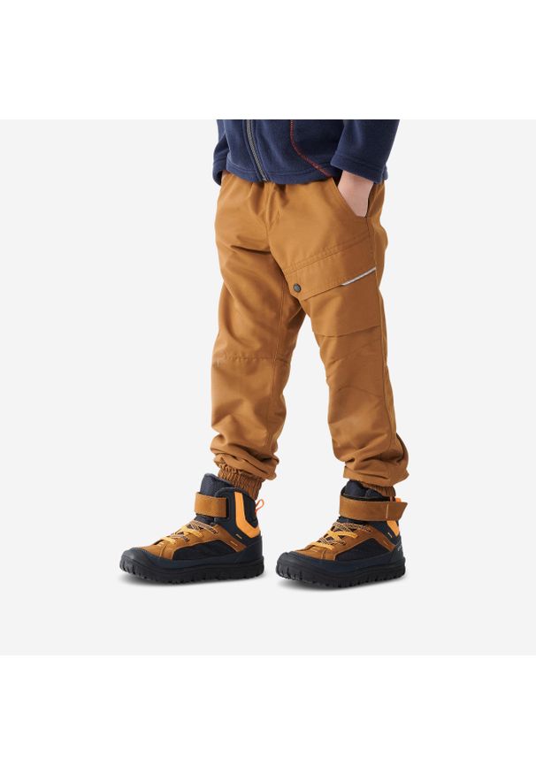 quechua - Spodnie turystyczne dla dzieci Quechua NH100 Warm. Kolor: brązowy. Materiał: poliester, materiał. Sezon: lato. Sport: turystyka piesza