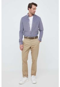 TOMMY HILFIGER - Tommy Hilfiger koszula bawełniana męska kolor granatowy slim z kołnierzykiem button-down. Typ kołnierza: button down. Kolor: niebieski. Materiał: bawełna. Wzór: aplikacja #2