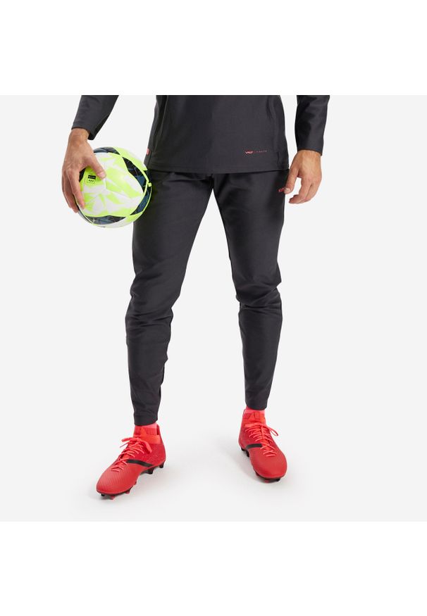 KIPSTA - Spodnie do piłki nożnej Kipsta Viralto Solo. Kolor: wielokolorowy, szary, czarny, różowy, czerwony. Materiał: materiał, poliester, elastan. Sport: piłka nożna