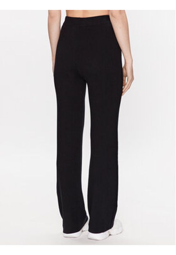 Calvin Klein Jeans Spodnie dresowe J20J222114 Czarny Relaxed Fit. Kolor: czarny. Materiał: lyocell