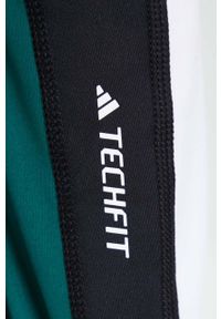 adidas Performance spodnie do jogi Studio kolor czarny gładkie. Kolor: czarny. Materiał: skóra, materiał. Wzór: gładki. Sport: joga i pilates #2