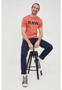 G-Star RAW - G-Star Raw spodnie męskie kolor granatowy w fasonie chinos. Kolor: niebieski. Materiał: tkanina