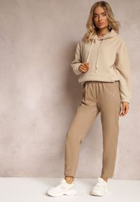 Renee - Beżowe Bawełniane Spodnie Dresowe Arnhilla. Kolor: beżowy. Materiał: bawełna, dresówka. Wzór: haft #4