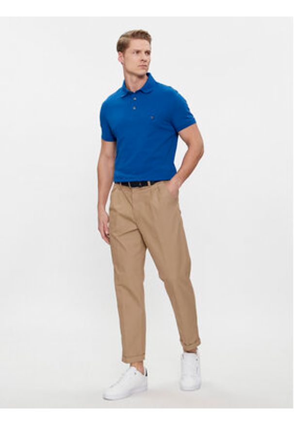 TOMMY HILFIGER - Tommy Hilfiger Polo 1985 MW0MW17771 Niebieski Slim Fit. Typ kołnierza: polo. Kolor: niebieski. Materiał: bawełna