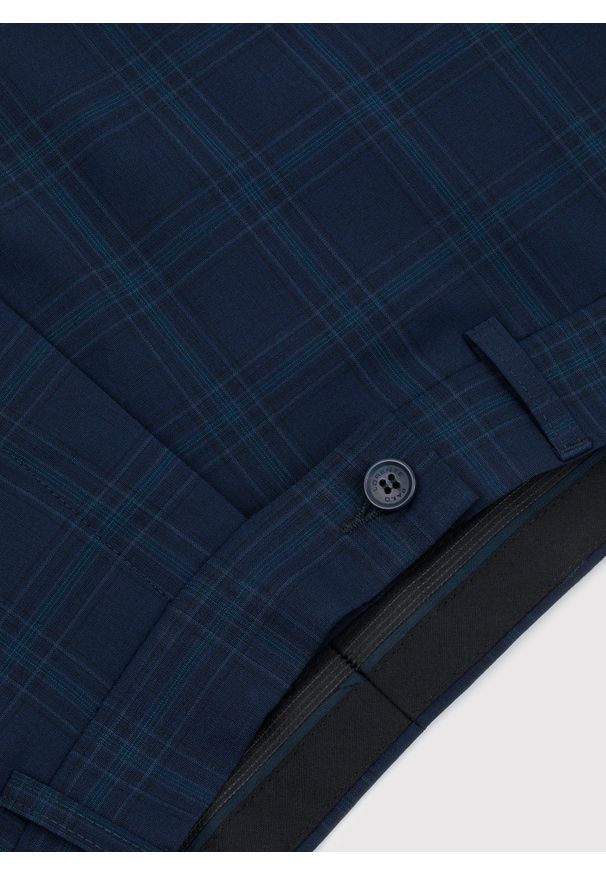 Pako Lorente - PAKO LORENTE – Granatowe spodnie garniturowe z wełną. Kolor: niebieski. Materiał: wełna