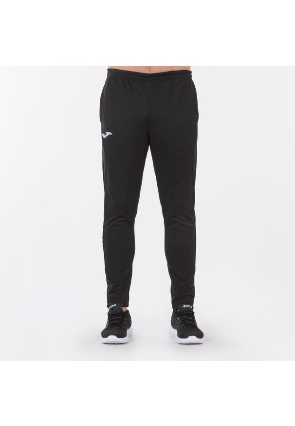 Spodnie do piłki nożnej dla chłopców Joma Championship IV długie. Kolor: czarny. Długość: długie. Sport: piłka nożna