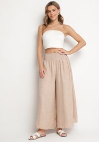 Born2be - Beżowe Spodnie Szerokie z Szeroką Gumką w Talii Koririelle. Okazja: na co dzień. Kolor: beżowy. Styl: elegancki, casual #7
