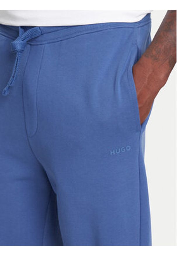 Hugo - HUGO Spodnie dresowe Dayote232 50489617 Niebieski Regular Fit. Kolor: niebieski. Materiał: bawełna