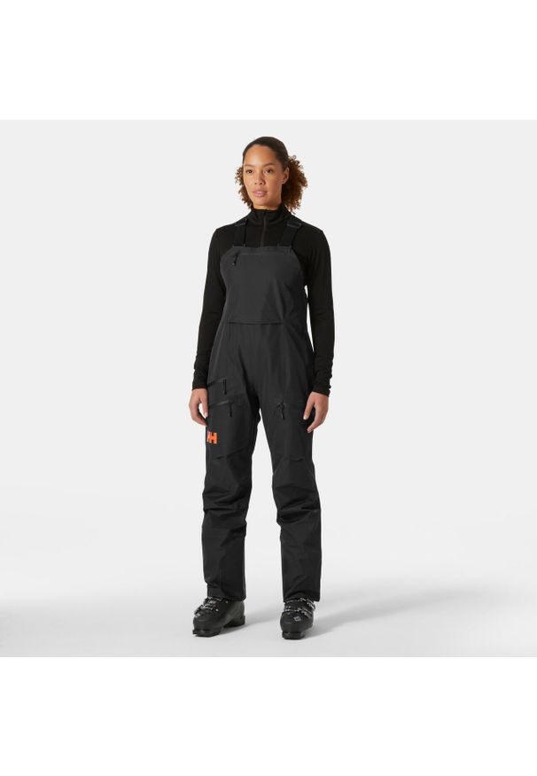 Damskie spodnie narciarskie na szelkach Helly Hansen Elevation Infinity Shell. Kolor: czarny. Materiał: puch. Sezon: zima. Sport: narciarstwo