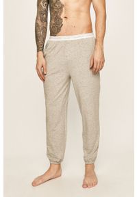 Calvin Klein Underwear - Spodnie piżamowe CK One. Kolor: szary. Materiał: bawełna, poliester, dzianina, elastan. Wzór: gładki #1