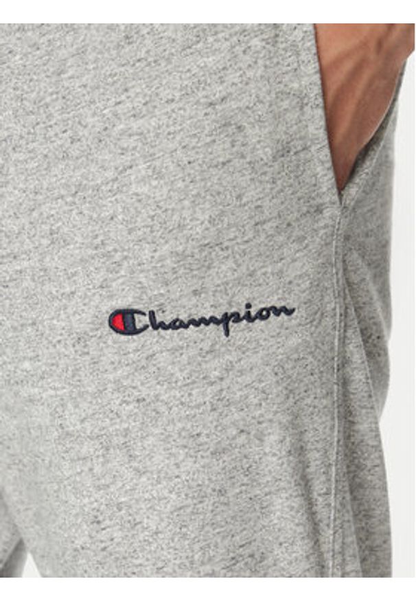 Champion Spodnie dresowe 220305 Szary Standard Fit. Kolor: szary. Materiał: syntetyk