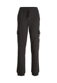 Jack&Jones Junior Spodnie dresowe 12237198 Czarny Relaxed Fit. Kolor: czarny. Materiał: syntetyk