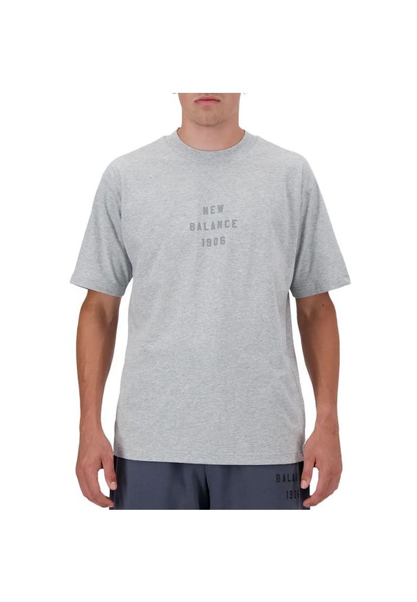 Koszulka New Balance MT41519AG - szara. Kolor: szary. Materiał: bawełna. Długość rękawa: krótki rękaw. Długość: krótkie