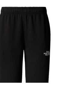 The North Face Spodnie dresowe Simple Dome NF0A8C1Y Czarny Regular Fit. Kolor: czarny. Materiał: syntetyk, bawełna #3