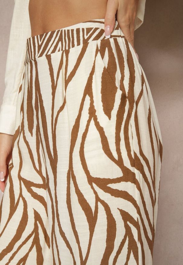 Renee - Brązowe Szerokie Spodnie z Wiskozy z Lnem High Waist w Zwierzęcy Wzór Fenariela. Okazja: na co dzień, na spacer. Stan: podwyższony. Kolor: brązowy. Materiał: len, wiskoza. Wzór: motyw zwierzęcy. Styl: klasyczny, elegancki, casual