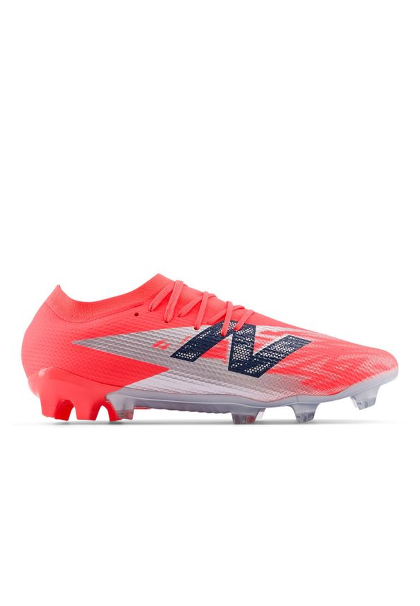 Buty piłkarskie New Balance Furon Team FG V8. Zapięcie: sznurówki. Wzór: jodełka. Sport: piłka nożna