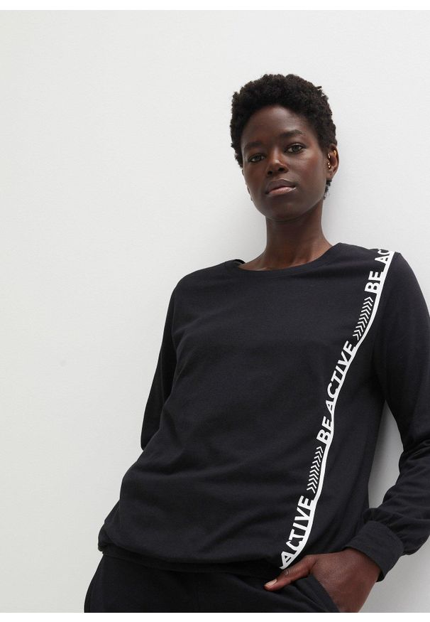 bonprix - Luźniejsza koszulka sportowa. Kolor: czarny. Długość rękawa: długi rękaw. Długość: długie. Styl: sportowy