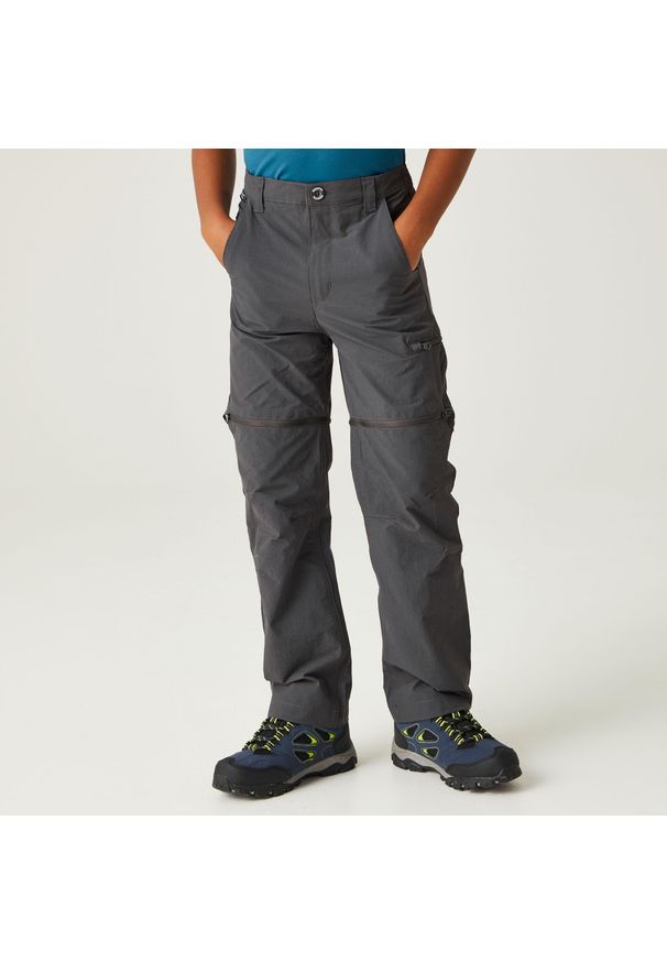 Regatta - Spodnie turystyczne dziecięce Jnr Highton Z/O z odpinanymi nogawkami. Kolor: szary. Sezon: lato. Sport: turystyka piesza