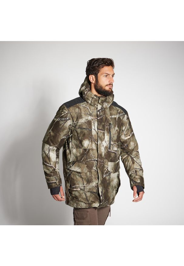 SOLOGNAC - Kurtka myśliwska Solognac 500 Warm wodoodporna camo treemetic. Kolor: wielokolorowy, brązowy, zielony. Materiał: polar, tkanina. Sport: outdoor