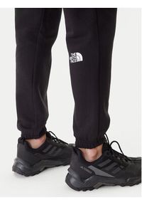 The North Face Spodnie dresowe Simple Dome NF0A8C1Y Czarny Regular Fit. Kolor: czarny. Materiał: syntetyk, bawełna #6