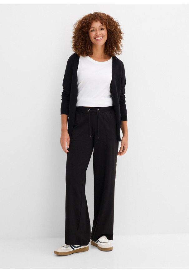 bonprix - Spodnie sportowe z mieszanki bawełny. Kolor: czarny. Materiał: bawełna. Styl: sportowy