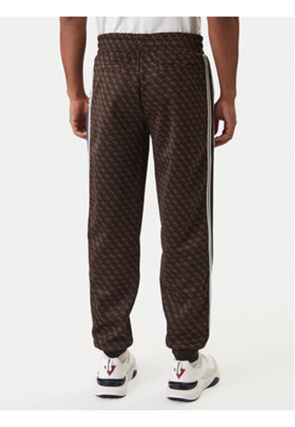 Guess Spodnie dresowe Z5BB19 K2042 Czarny Regular Fit. Kolor: czarny. Materiał: syntetyk